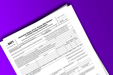 Form 5471 documentation published IRS USA 43933. American tax document on colored