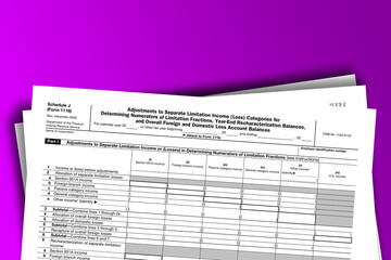 Obraz premium Form 1118 (Schedule J) documentation published IRS USA 44115. American tax document on colored