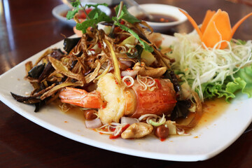 Classic Thai food dishes, Fried Giant River Prawn in Spicy Herb Salad served with spicy sauce, mint...