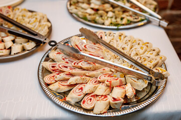 Set of sliced pancake rolls with different fillings