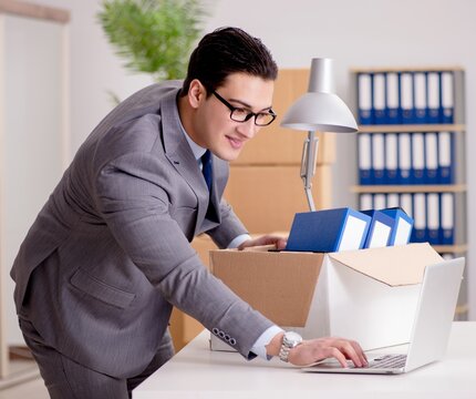 Businessman Moving Offices After Promotion