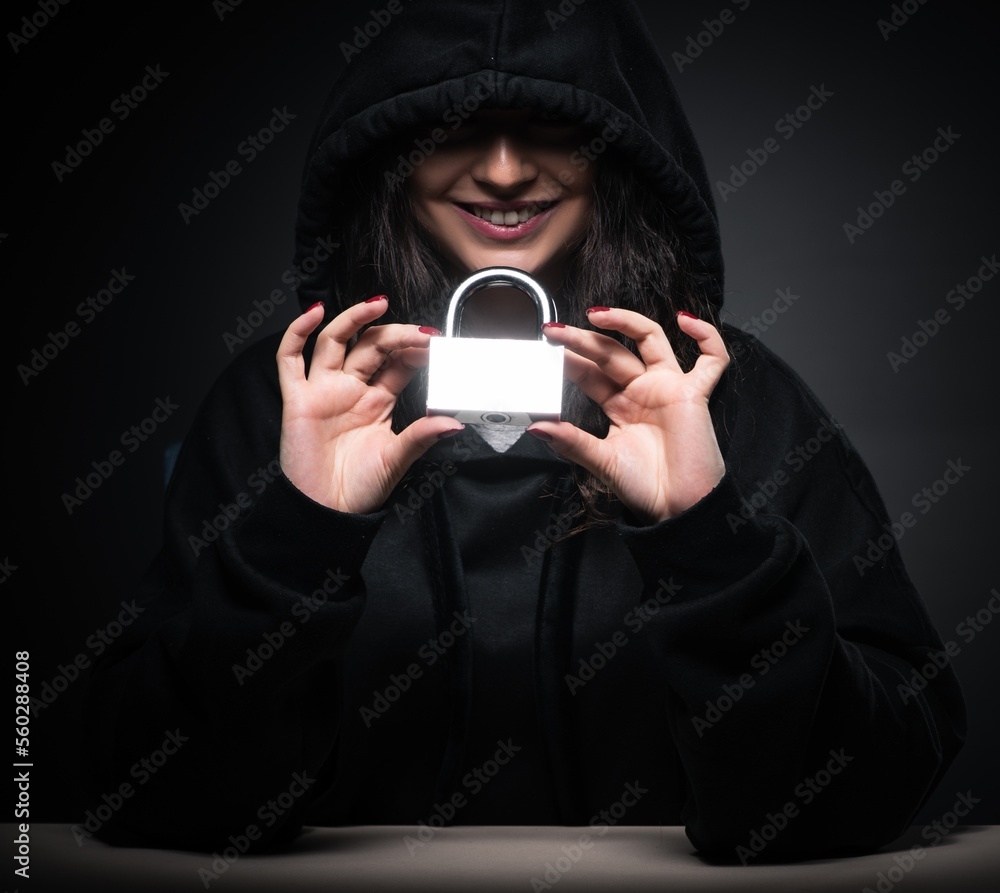 Poster female hacker hacking security firewall late in office