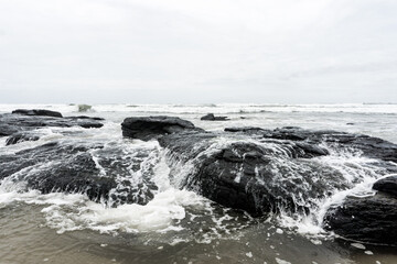 Violent waves impacting on beach rock in Goa. 