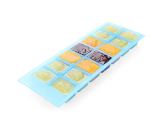 Different puree in ice cube tray isolated on white. Ready for freezing