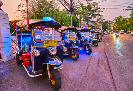 Parked tuk tuks by the road, on May 3 in Chiang Mai, Thailand