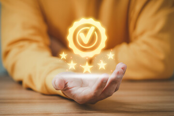 Adult man shows the sign of the top service the best quality assurance with golden five stars....