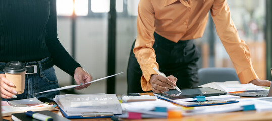 Businesswoman advisor, business people talking, planning analyze investment and marketing on tablet...
