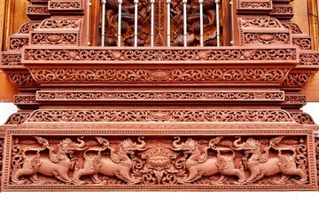 Thai art sculpture around Wat Ban Den buddhist sanctuary wall, Chiangmai Thailand 