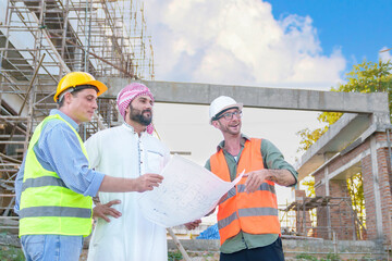 Diverse team of professionals using tablet computers on construction site. Real estate construction project. with civil engineers, architects, Arabic business investors and explorer with theodolite