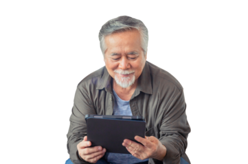 Happy senior Asian man using a tablet smartphone