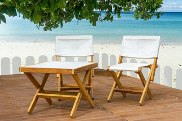 Outdoor wooden Table set with Field Tents group in the Camping area at Natural Parkland and river views background