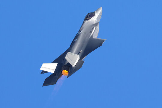 Tail view of a F-35A Lightning II  with afterburner on 