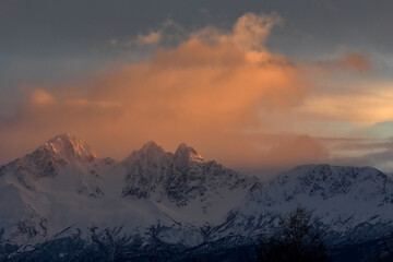 Fototapeta na wymiar Cloudy pastel sunset in the mountains of Alaska.