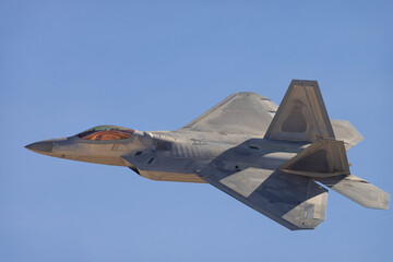 Fototapeta na wymiar Close side view of a F-22 Raptor in beautiful light