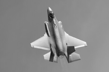 Unusual extremely close top view of a F-35A Lightning II  with afterburner on