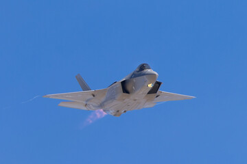 Extremely close frontal view of a F-35A Lightning II  approaching, with afterburner on