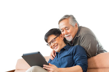 Happy senior asian father and adult son using tablet smartphone