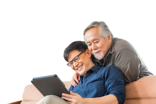 Happy senior asian father and adult son using tablet smartphone