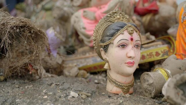 Rubbish With Ganesh Statue Remains After Chaturthi Festival In Chowpatty Beach, Mumbai India. Close Up