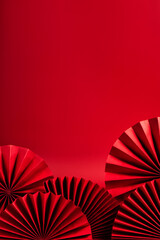 Chinese Lunar New Year background with red paper fans