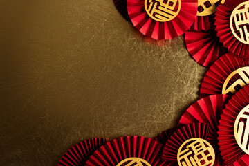 Chinese Lunar New Year golden background with red paper fans