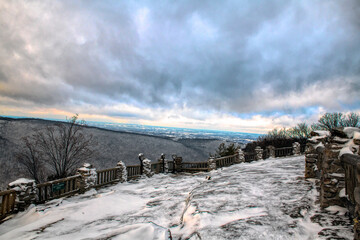 Coopers Rock Winter day with blown snow over the rock