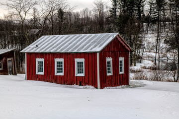 Old red building in the snow