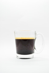 hot black coffee put on white table background