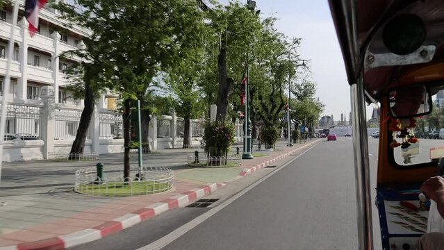 Bangkok, Thailand. December 29, 2022. The view from Tuk tut driving on the road in Bangkok.