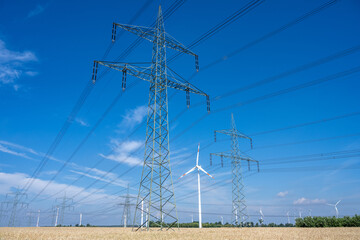 Power lines, electricity pylons and wind turbines seen in Germany