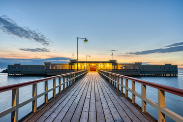 The pier and Ribersborg Kallbadhus in Malmo after sunset
