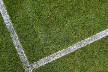 White lines on a grass tennis court