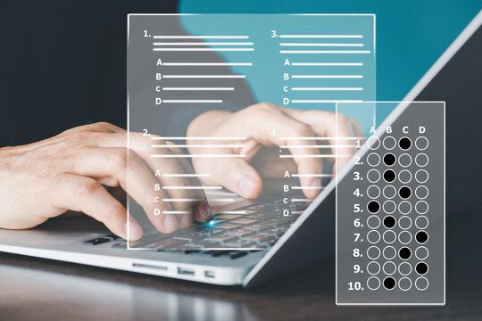 On-site learning ,teaching and test, assessment or academic exam and answer multiple choice questions on computer screen. E-learning, remote student, survey, questionnaire, quiz on internet.