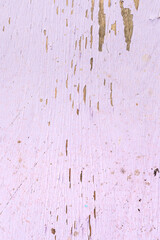 Weathered wood with cracked pink paint