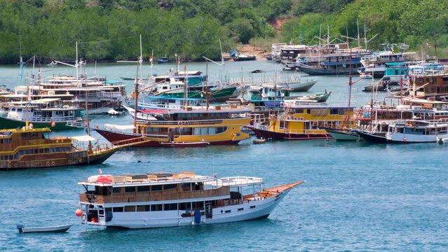 Masses of liveaboard boats docked in fishing village of Labuan Bajo, Flores island, Nusa Tenggara region of east Indonesia