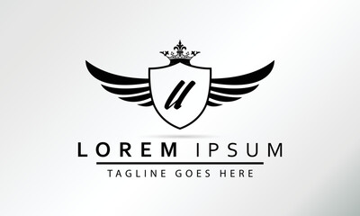 Obraz premium Stylish Black Shield With Wings, Crown And Initial Letter U Isolated On White Background. Luxury Logo Business Vector Template. Modern Design Logotype, Emblem,