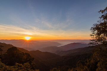 Beautiful sunrise over the mountain range at the east of Thailand.