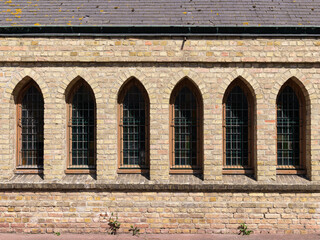An old church with medieval windows at daylight