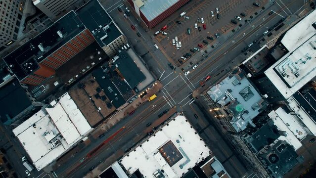 cinematic top down of a intersection in milwaukee wisconsin then revealing lake michigan scenary and 
interstate 794 - john plewa mem lk pkwy. Sunrise aerial