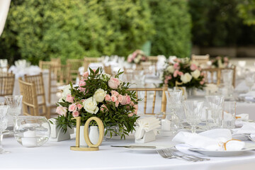 Wedding tables setting for dining outdoors. Wedding, decoration, celebration, floral design, holidays concept