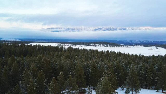 Winter's Majestic Scene: A Sunset View of Snowcapped Mountains in British Columbia