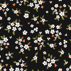 Vector floral seamless pattern. Abstract luxurious background with small orange and white flowers on a black background, leaves, branches. Liberty style wallpaper.