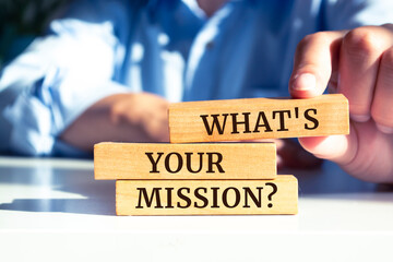 Closeup on businessman holding a wooden block with 