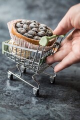 Blueberry goat cake with blue berries in  shopping cart