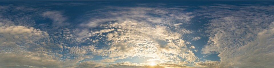 Obraz premium Dark blue sunset sky panorama with golden Cumulus clouds. Seamle