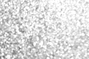 Abstract white gray silver bokeh background.   New Year, Christmas and all celebration background concepts.