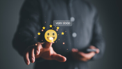 close up businessman hand touching on five star icon and happy smile face for feedback review satisfaction service, Customer service experience and business satisfaction survey.