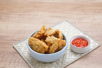 Crispy Fried Oyster Mushroom or Jamur Krispi served with chilli sauce
