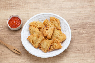 Crispy Fried Oyster Mushroom or Jamur Krispi served with chilli sauce
