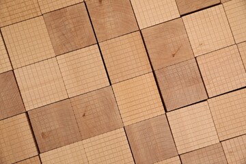 Set of wooden cubes as background, top view. Montessori toy